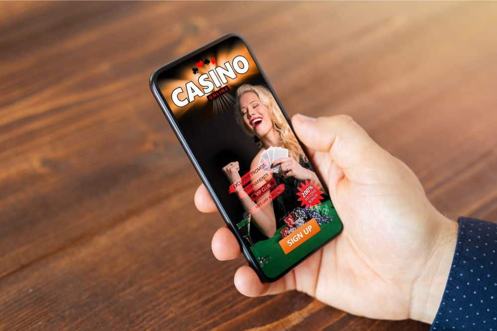 osoba igra u online casinu putem mobitela